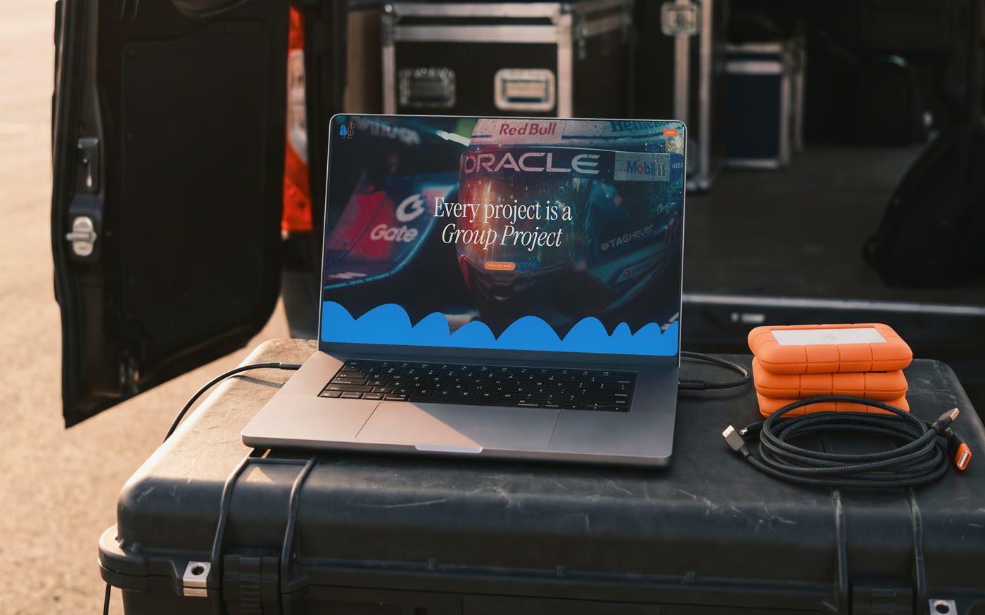Group Project, the site on a laptop on a road case